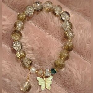 Elegant Gold Beaded Bracelet with Butterfly Charm